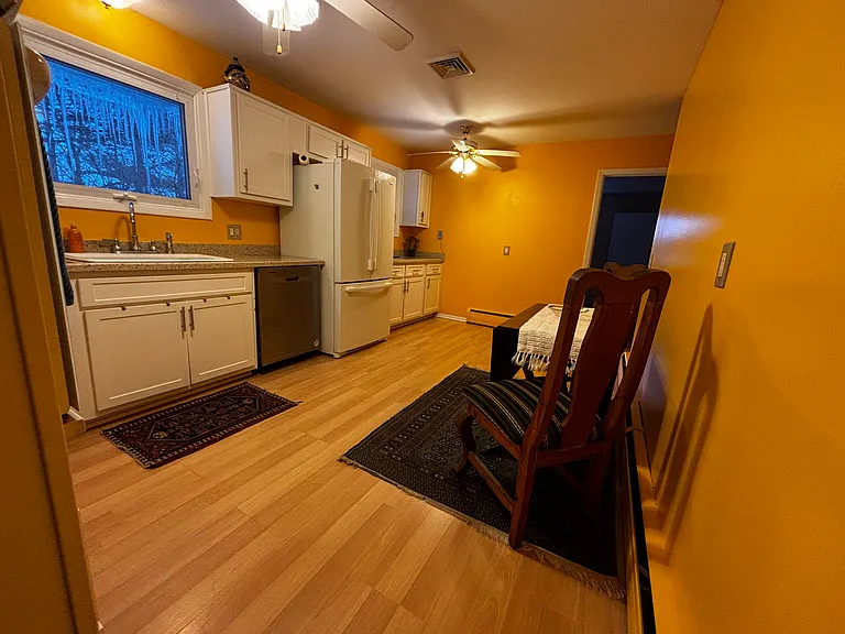 Kitchen leading to the den