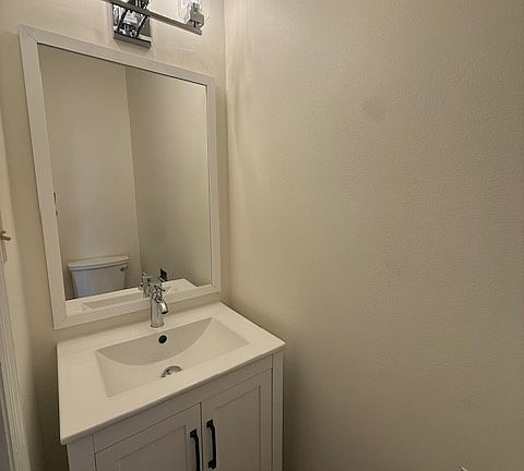 There is a 1/2 bath on the first floor for guests.