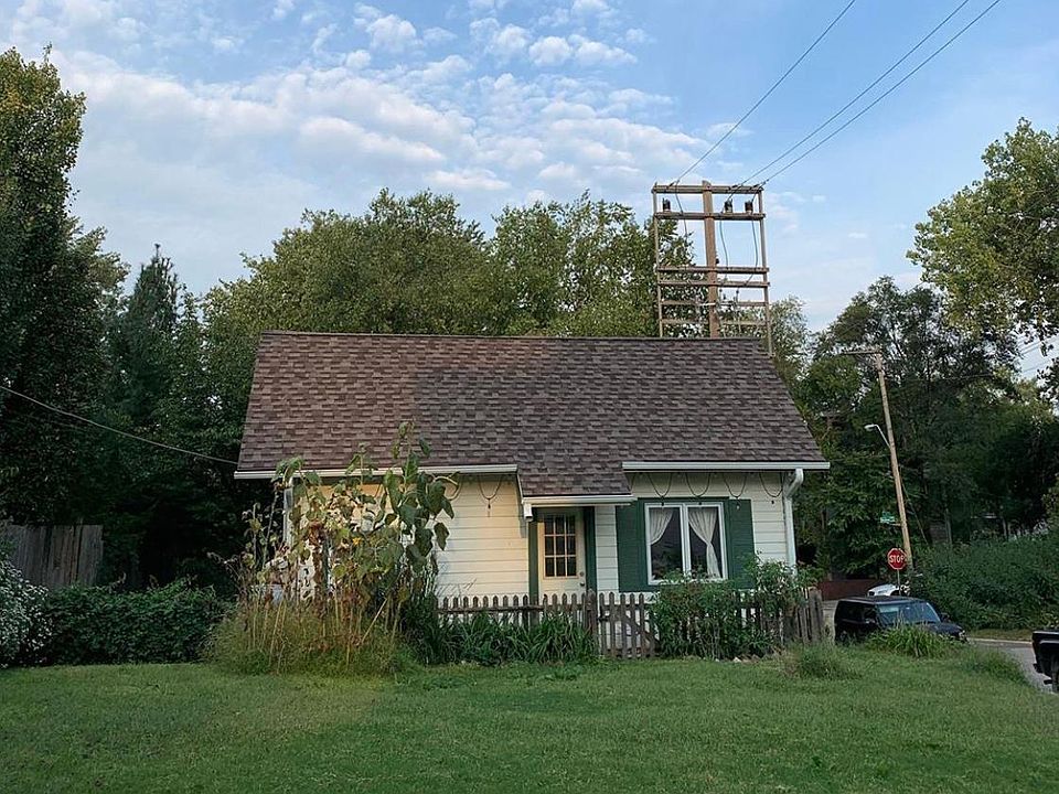 On street parking to the right; fenced side yard to the left.