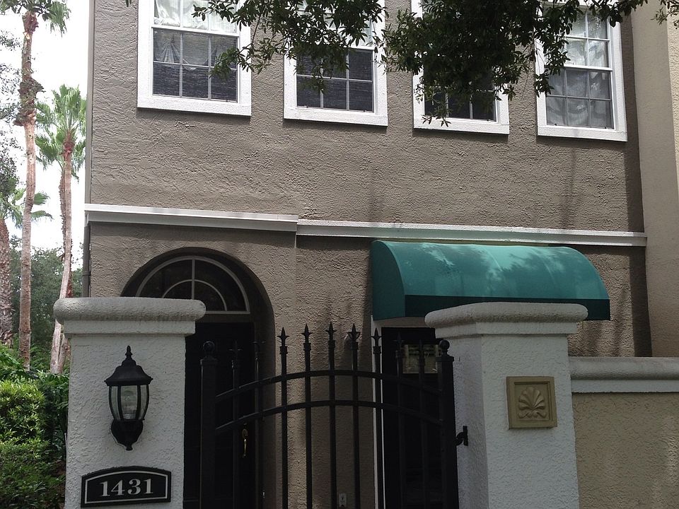 Beautiful courtyard with French doors to bonus roomo