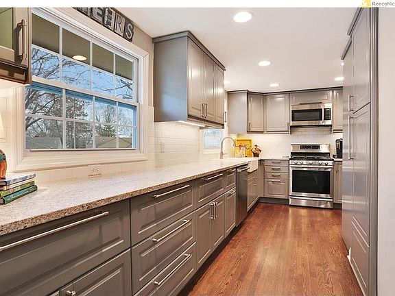 Gorgeous, custom kitchen with plenty of storage, soft-close