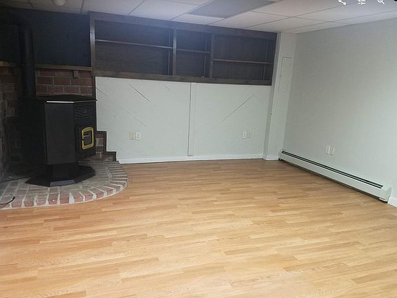 Oversized bedroom with built-in shelves.