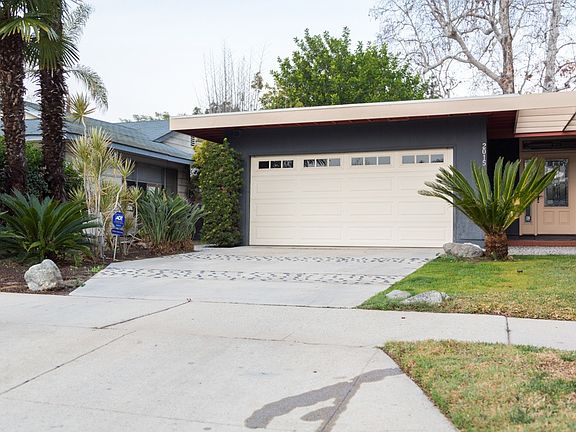 Two car attached garage with washer & dryer