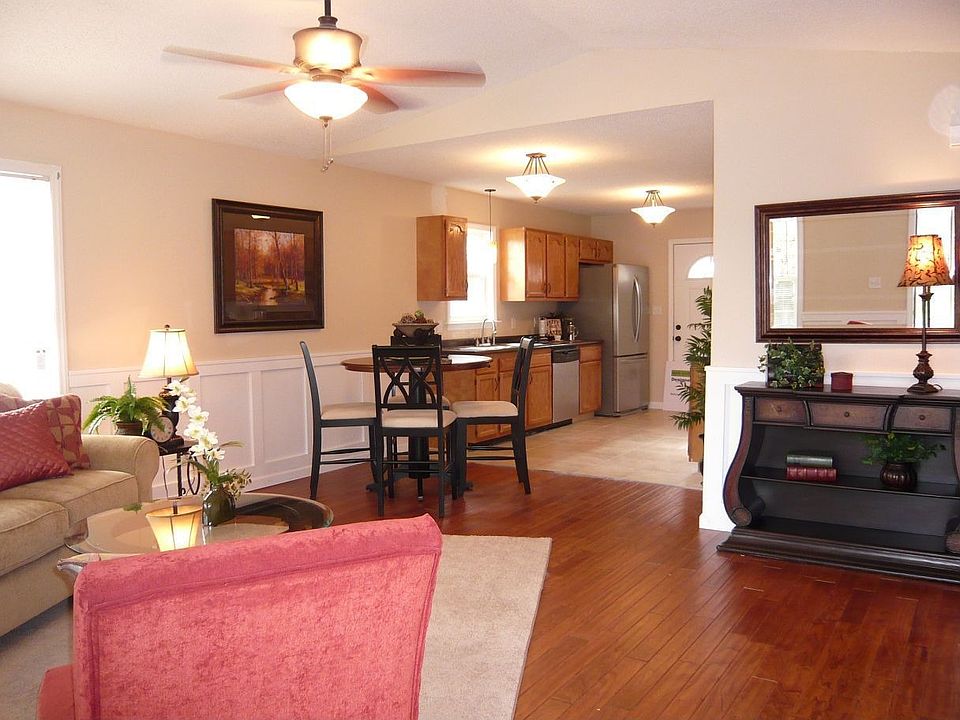 Hand scraped elm floors, vaulted ceiling, and custom wainscotting