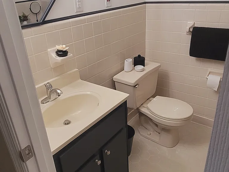 En-suite bathroom with shower attached to second floor bedroom