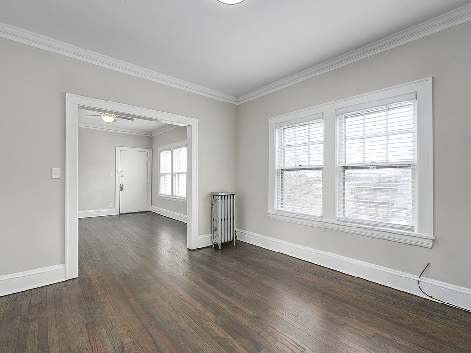 View of dining room and living room, lots of natural light.