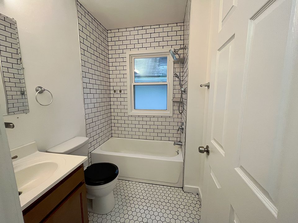Newly renovated bathroom with custom tile shower