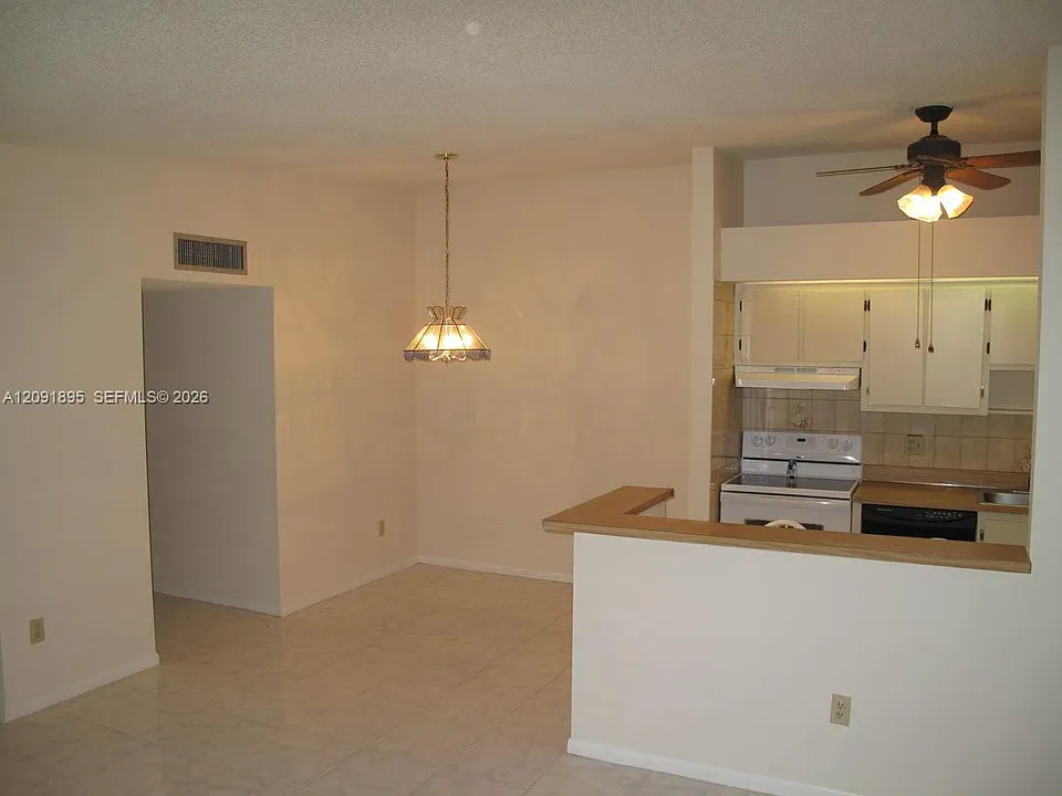 9940 S Belfort Cir #203