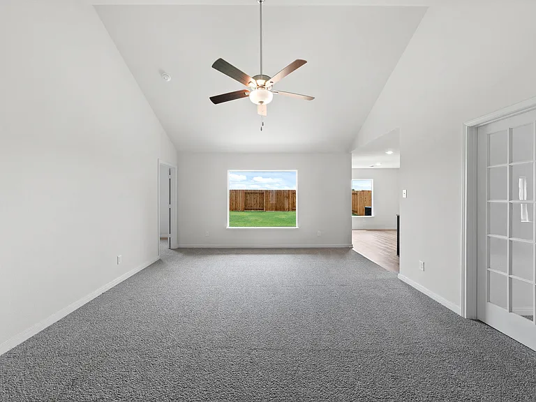 The spacious family room is perfect for family living and hosting.