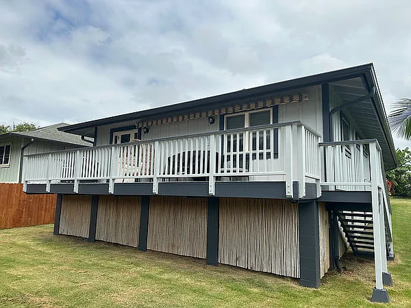 Extra storage below the house. Large lanai area for entertaining or relaxing. Yard is fully fenced!