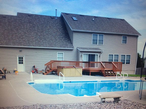 Large deck, pool and hot tub