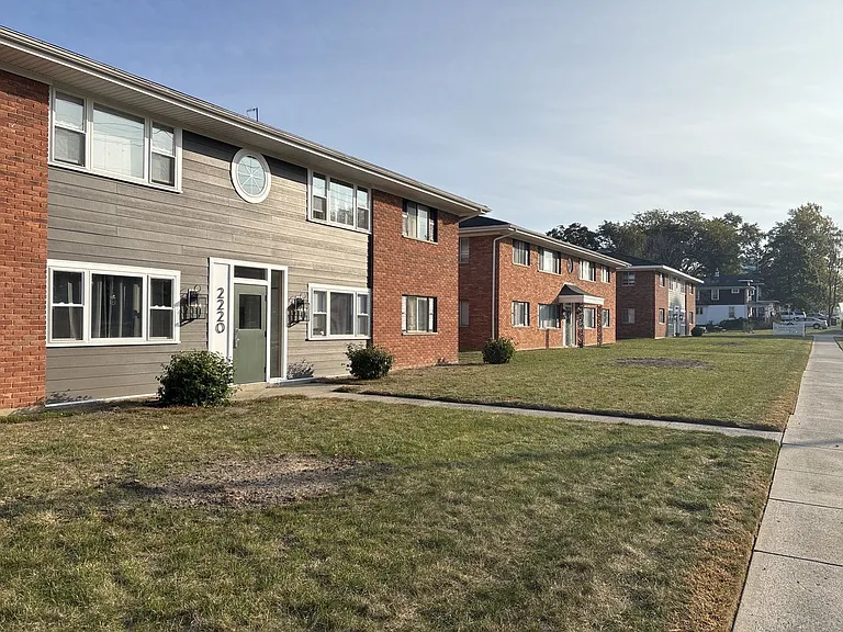 Village Apartments — Photo 16