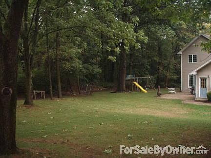 Great Room
						:
						Inside double doors is a large closet and wet sink for possible bar area.