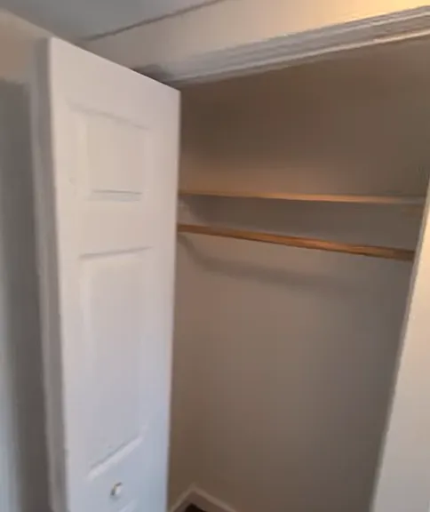 Bedroom 3 upstairs. Photo only captures closet.