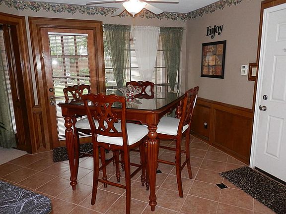 Breakfast room overlooking backyard