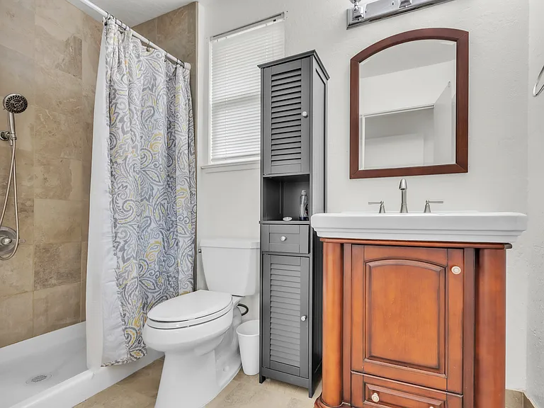 PRIVATE BATHROOM
Master bedroom with private bathroom and ADA walk in shower