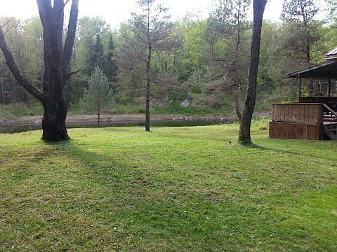 POND & SIDE OF NEW CABIN
