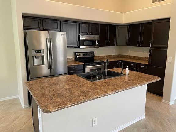 4th image of 9431 E Onza Ave