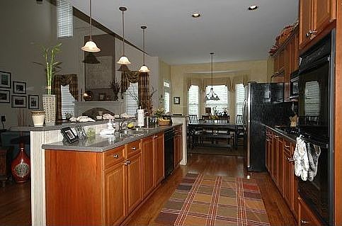 Double Ovens, Gas Cooktop, Hardwood Floors