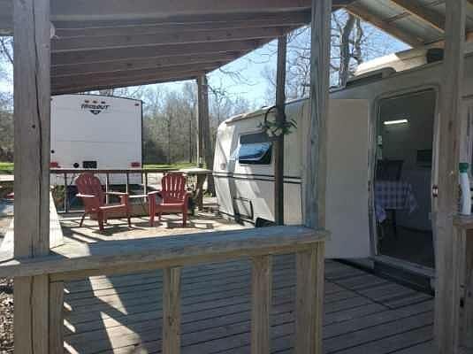 COVERED DECK IN FRONT OF RV