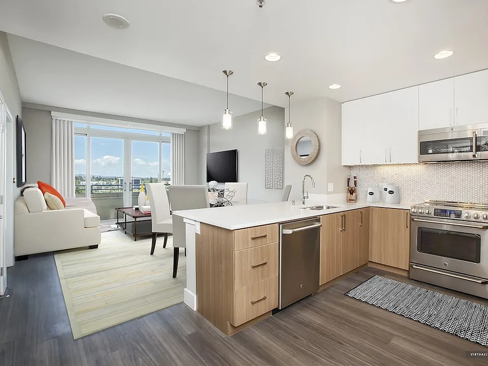 Signature Collection Kitchen Living and Dining Area with Hard Surface Vinyl Plank Flooring