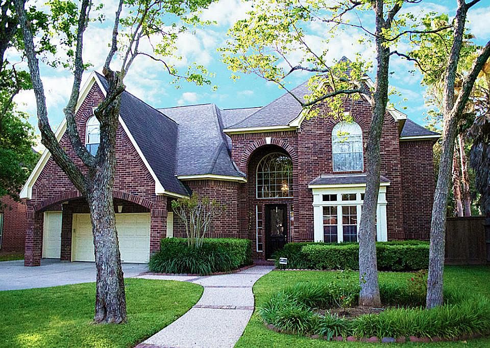 Welcome Home to this Beautiful Home Nestled Among the Trees!