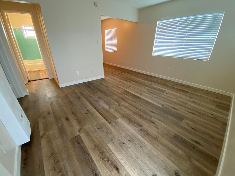 Living room looking into the kitchen and bathroom