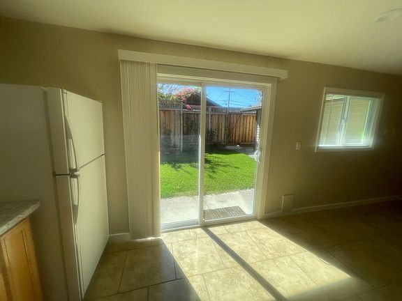 The sliding glass door and 2 windows in the kitchen Bring tons of natural light