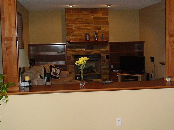 Living room with semi enclosure giving it a rich look