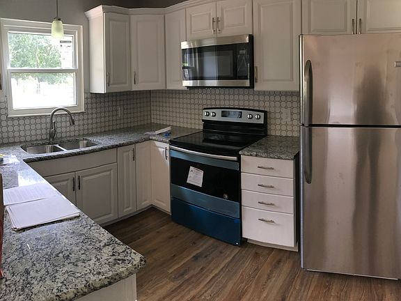 4th image of 6028 Woodbark Trce