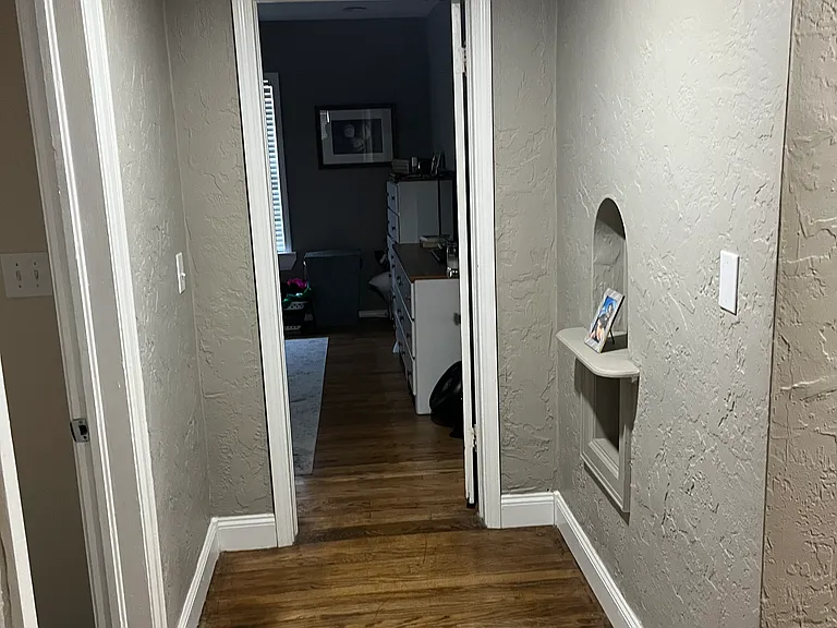 Hallway between bedrooms.