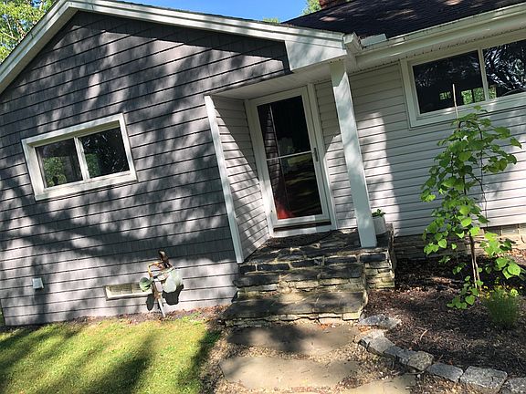 Natural stone sidewalk and porch installed 2019