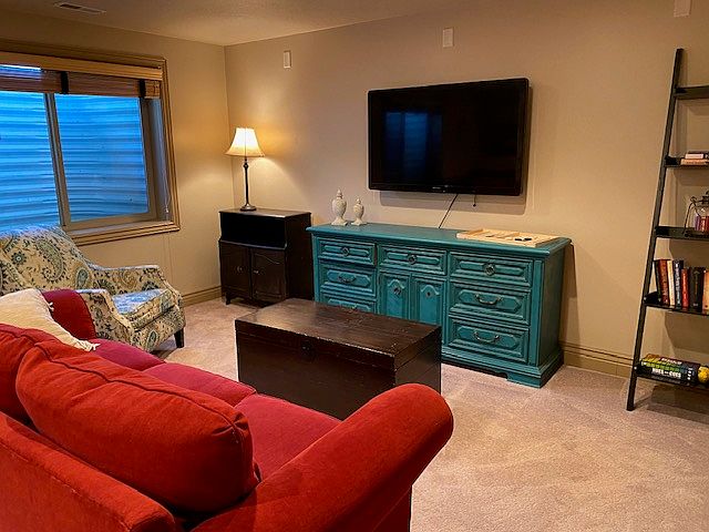 Comfortable seating area with Roku TV