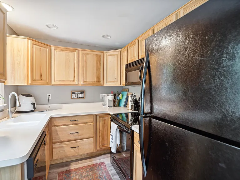 9065 Elmhurst Ave — Photo 5