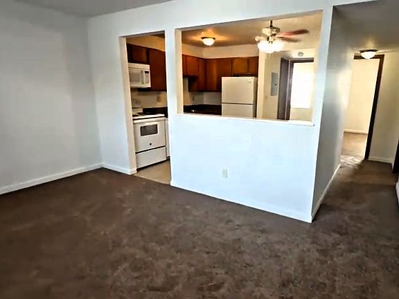 Living room, kitchen, hallway to bedrooms