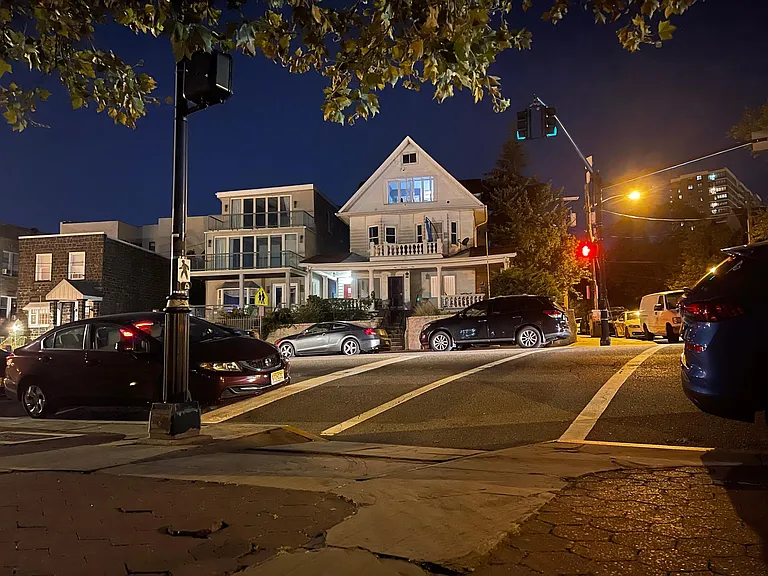 house as seen across the street.
