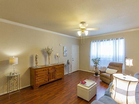 Fresh paint. neutral decor, crown molding
