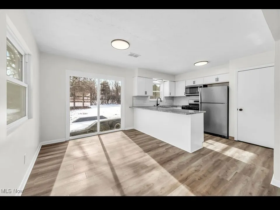 Plenty of space for dining room table with access to new sliding door that leads to the backyard