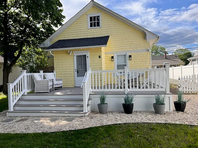 Deck with lounge seating and dining for 8