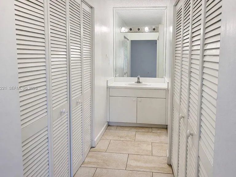 1755 W 60th St #D212 — Photo 17