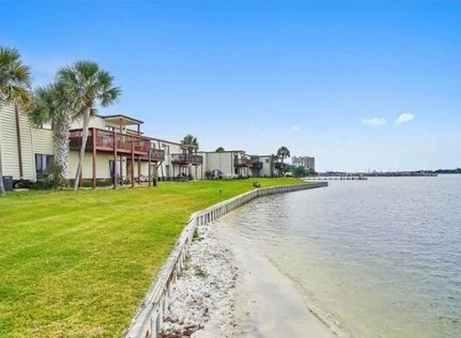 Expansive waterfront covered patio off this fully renovated Fort Walton Condo! — Photo 2
