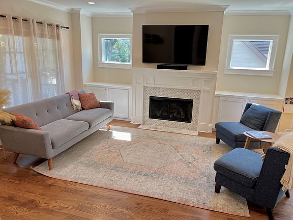 Large open living room with gas fireplace