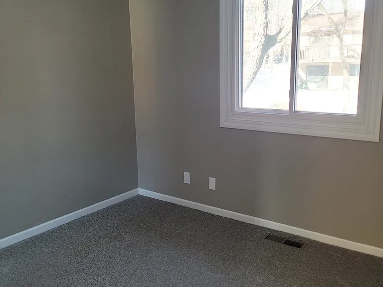 All three bedrooms with newer carpet, neutral paint and newer windows