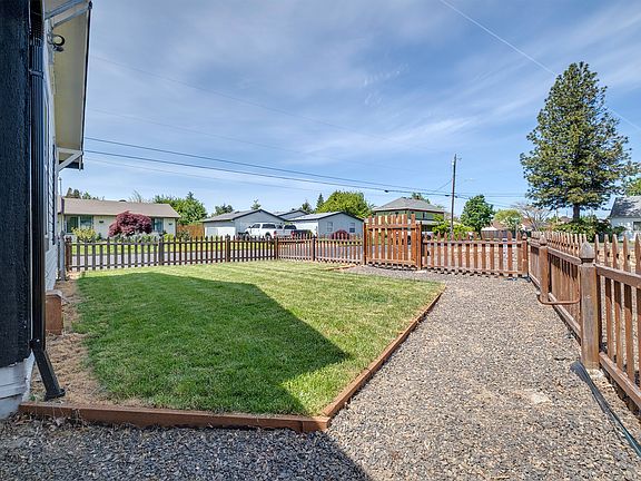 extra wide, clean walking area within fence.