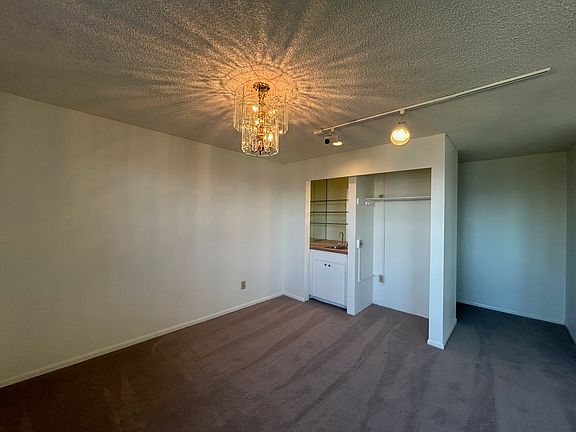 Upper floor bonus area - office or study with bar sink and shelving