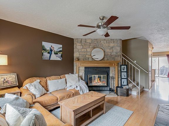 Main Level Livingroom with wood burning fireplace and custom mantel
