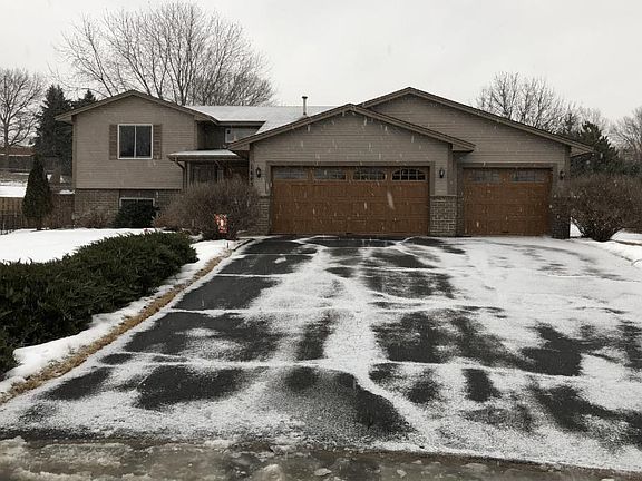 Beautiful Curb appearance, Attractive garage doors, well maintained driveway with oversized garage. Mature bushes accent the beauty of the front of the lot.