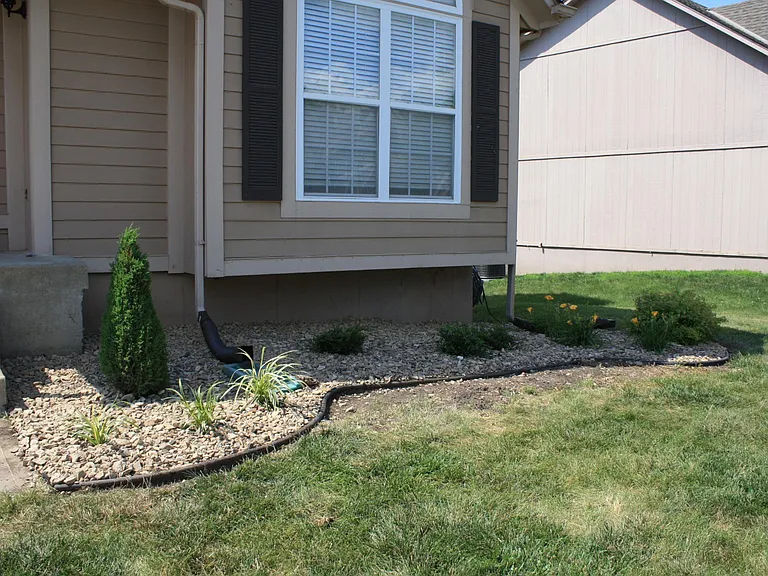 New landscaping with river rock