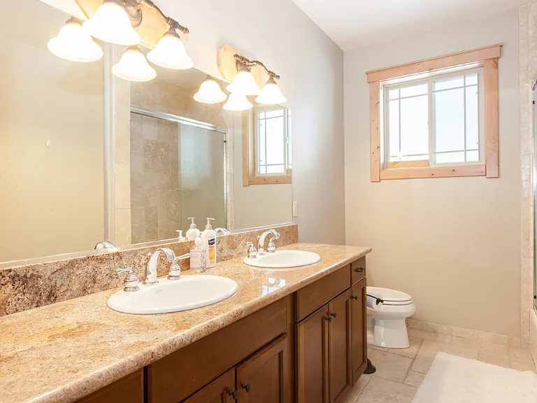 Downstairs Full Bathroom. Dual Sinks.
