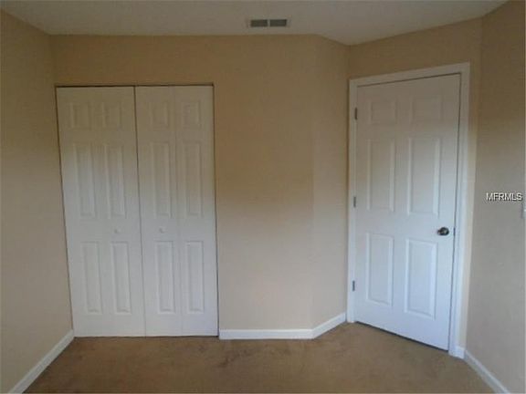 5th image of 10167 Sailwinds Blvd N APT 205